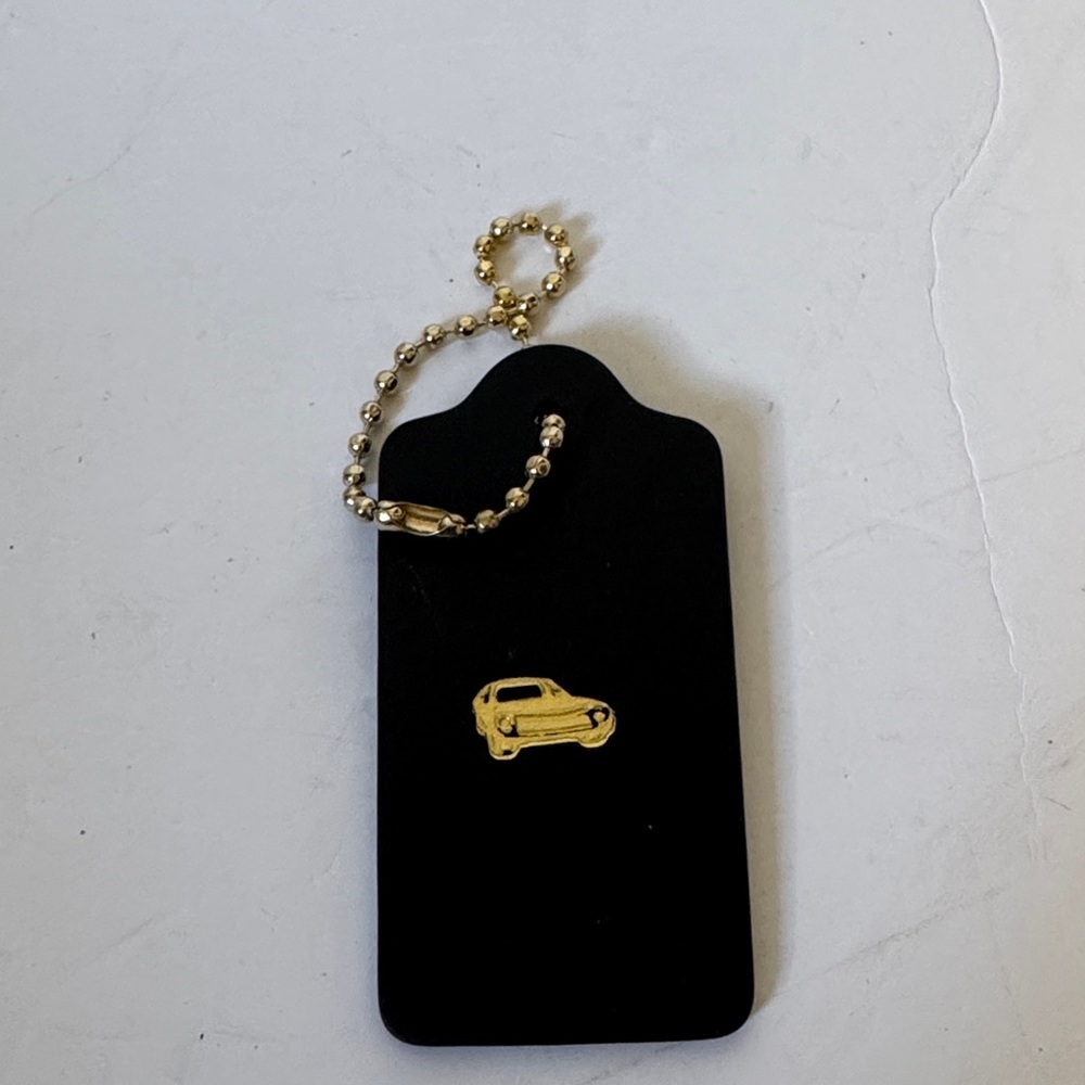 Coach large car hang tag